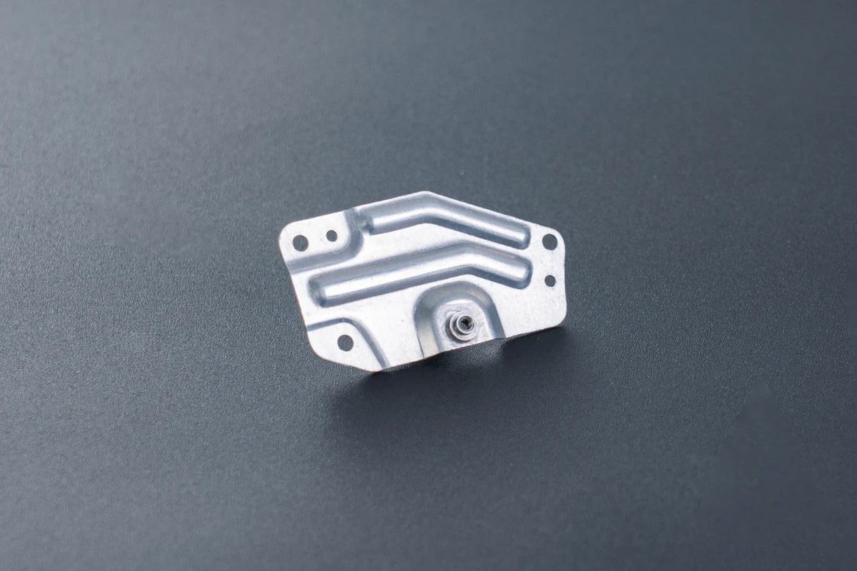 Precision Metal stamped part with holes and grooves
