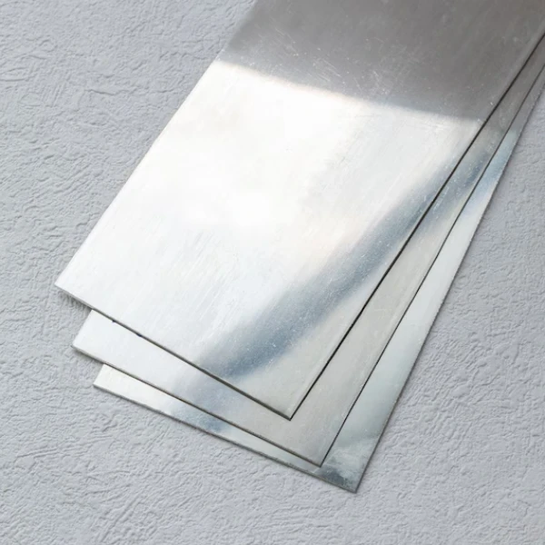 Stack of silver colored metal sheets
