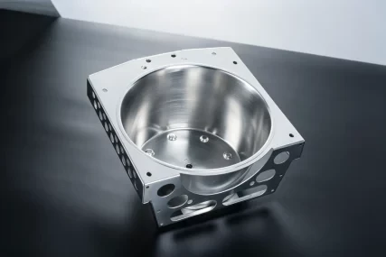 Stainless steel metal part with holes and cutouts